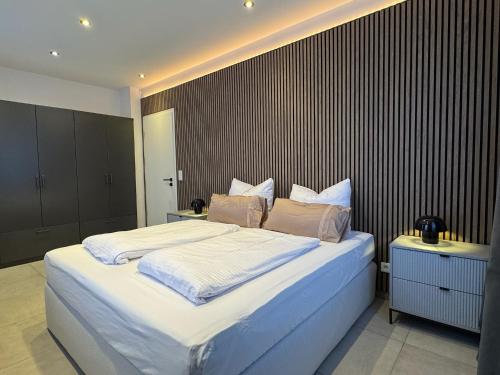 Postel nebo postele na pokoji v ubytování Apartment am Marktplatz mit XXL Garage