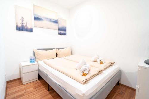 Ένα ή περισσότερα κρεβάτια σε δωμάτιο στο Gemütliches Apartment nähe Bahnhof und Hochschule