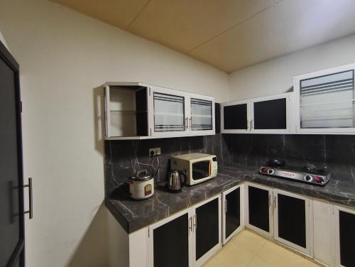 Η κουζίνα ή μικρή κουζίνα στο Villa Rest Haven