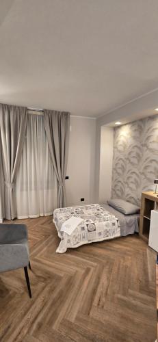 Postel nebo postele na pokoji v ubytování Re Carlo - Appartamento Filomena