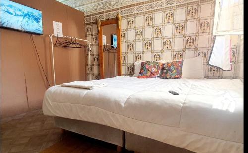 Un pat sau paturi într-o cameră la DarCom centre