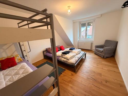 Una cama o camas en una habitación de Grandhouse Olten City Apartments