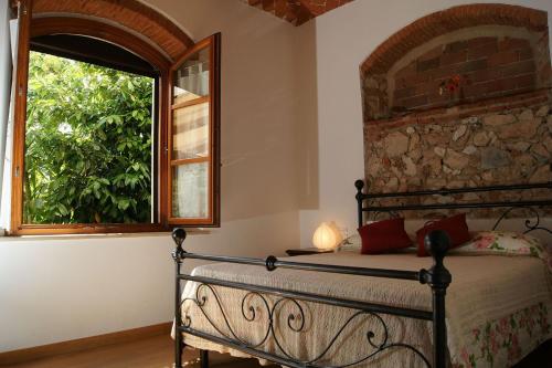 Postel nebo postele na pokoji v ubytování Appartamento Ibisco Seaside and Pool