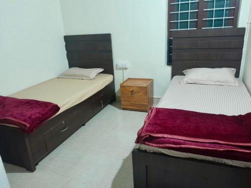 Ένα ή περισσότερα κρεβάτια σε δωμάτιο στο Dua farms