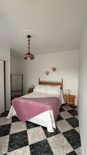 Postel nebo postele na pokoji v ubytování Habitaciones Lasa