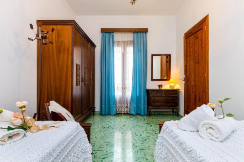 Giường trong phòng chung tại YourHouse Ca Na Fonoy apartment