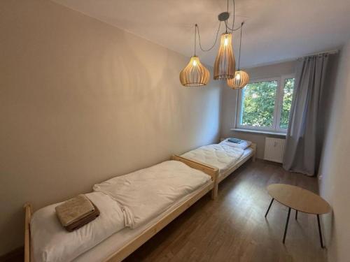 Postel nebo postele na pokoji v ubytování Albert self check-in free parking