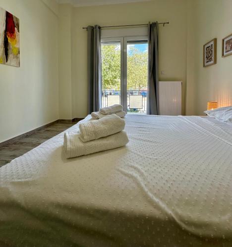 Giường trong phòng chung tại ESTIA Dionysos