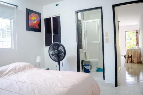 Кровать или кровати в номере Aparta Estudio Amoblado 1 a 3 Personas