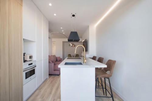 Una cocina o cocineta en DELUX Nogalera Apartment