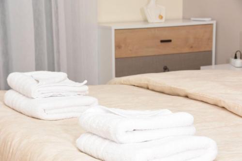 Giường trong phòng chung tại Sparta Central Stay