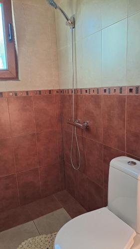 Koupelna v ubytování Yellow villa Fani