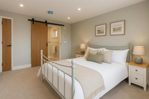 a bedroom with a large bed with white pillows at 1 Bed in Castleton oc-t34011 in Castleton