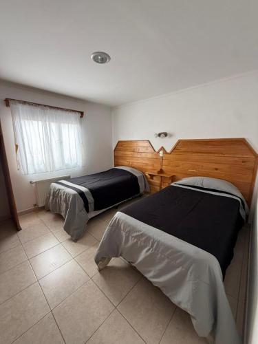 Postel nebo postele na pokoji v ubytování Cabañas kami