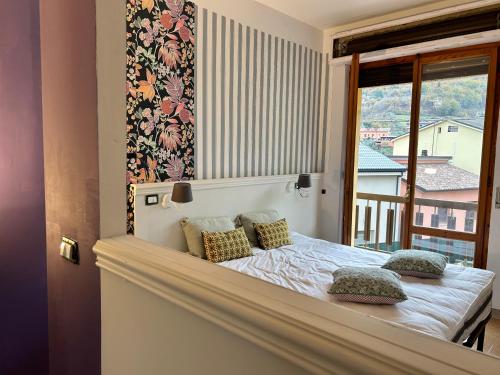 Ένα ή περισσότερα κρεβάτια σε δωμάτιο στο Don Carlo