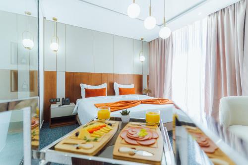 Una cama o camas en una habitación de TheMirell Hôtel Dakhla