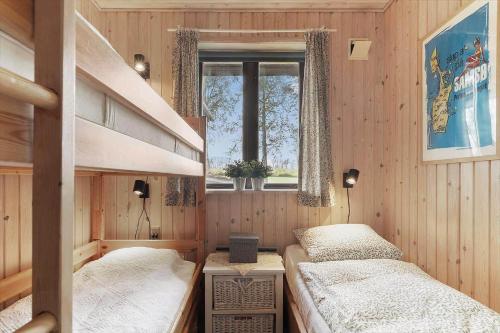 Postel nebo postele na pokoji v ubytování 20425-Samso-Honeballevej-33