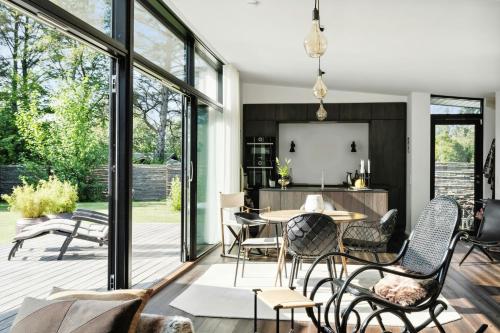 Posezení v ubytování Forkælelse I Arkitekttegnet Hus Ved Vejby