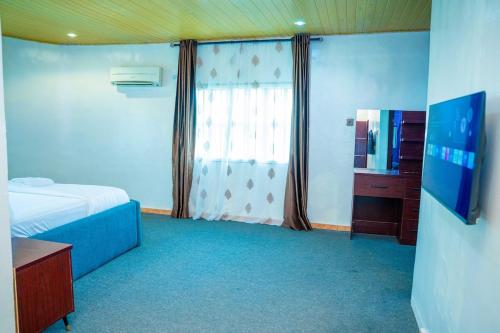 Ένα ή περισσότερα κρεβάτια σε δωμάτιο στο Spacious 4-Bedroom Apartment for families & groups