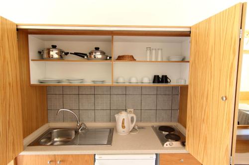 Η κουζίνα ή μικρή κουζίνα στο LINDOS HORIZON