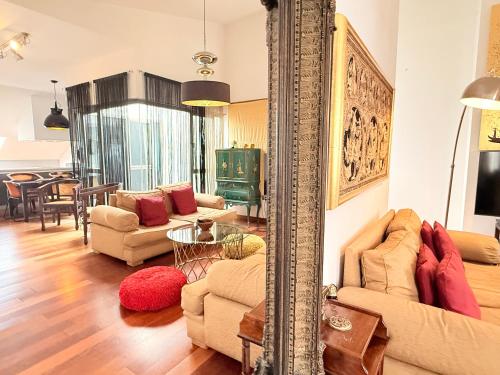 Posezení v ubytování Ático en Plaza de la Constitución 3 bedrooms