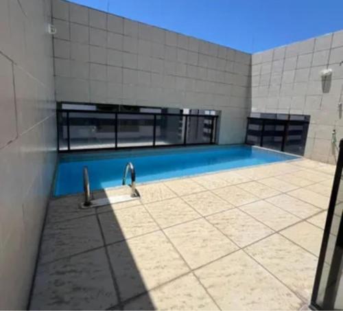 Πισίνα στο ή κοντά στο Apartamento na Praia da Ponta verde