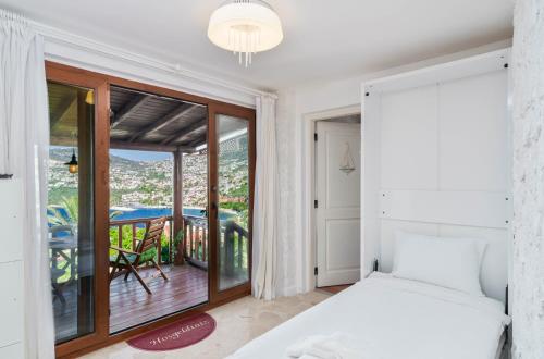 En eller flere senge i et værelse på TEKCE Club Patara N74