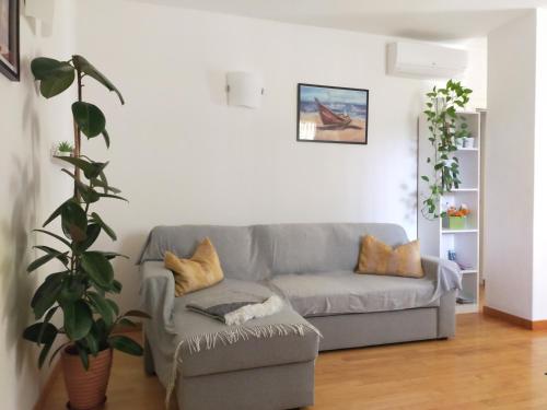 Coin salon dans l'établissement Appartamento Le Nuvole da Davide e Romina