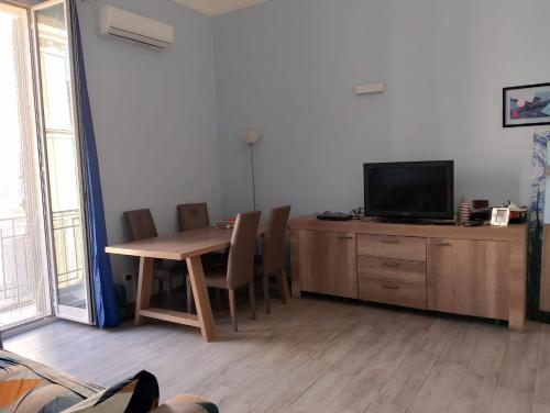 TV a/nebo společenská místnost v ubytování casa adriana