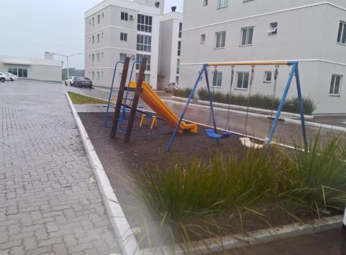 De kinderspeelruimte van Apartamento Res Ilha Bella