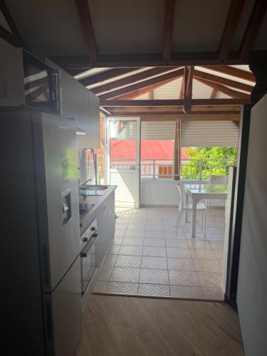 Kuchyň nebo kuchyňský kout v ubytování Villa Lolyka