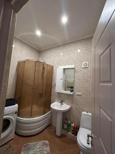 Un baño de Apartment 9