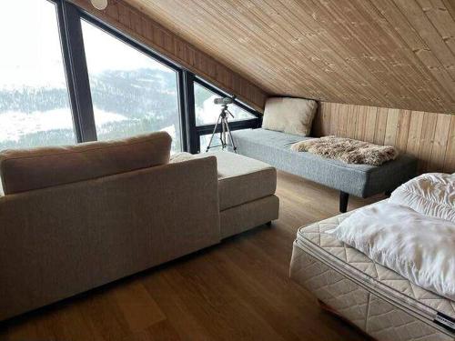 Postel nebo postele na pokoji v ubytování Cabin With Ski Inout And View Of Løefjell