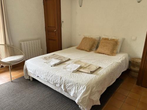 Postel nebo postele na pokoji v ubytování La Bergerie