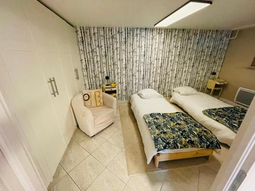 Gallery image of Appartement indépendant 2chambres dans maison in Boissy-lʼAillerie