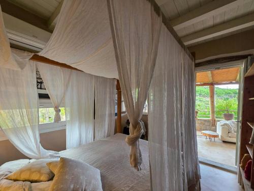 Postel nebo postele na pokoji v ubytování Vintage House With Terrace On The Elba Island