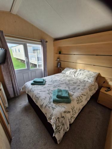 Ένα ή περισσότερα κρεβάτια σε δωμάτιο στο Ocean Front Lodge