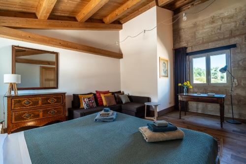 Postel nebo postele na pokoji v ubytování Agriturismo Pietre di Gelo