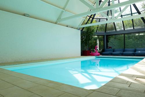 Πισίνα στο ή κοντά στο La Maison Du Lac avec Piscine- Les Demeures d'Adrien