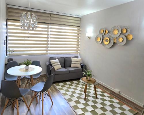 Posezení v ubytování Departamento primera línea frente al casino.