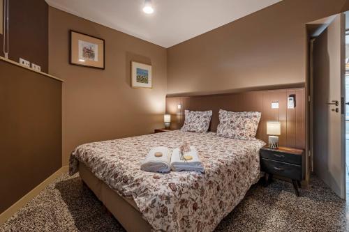 Ένα ή περισσότερα κρεβάτια σε δωμάτιο στο Orange Apartments A