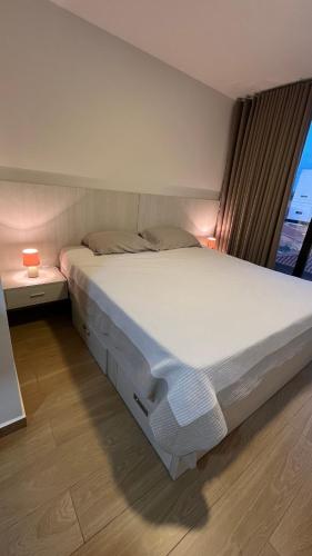 Ένα ή περισσότερα κρεβάτια σε δωμάτιο στο Monoambiente, capacidad 3 personas