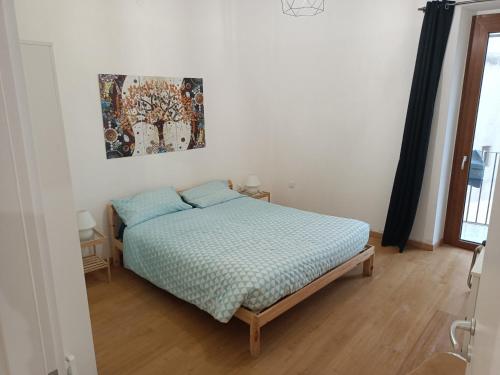 Postel nebo postele na pokoji v ubytování Casa vacanze Sulmona centro