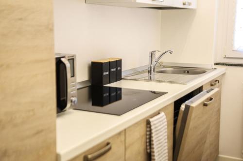 Kuchyň nebo kuchyňský kout v ubytování Casa vacanze moderna a 500m dalle piste