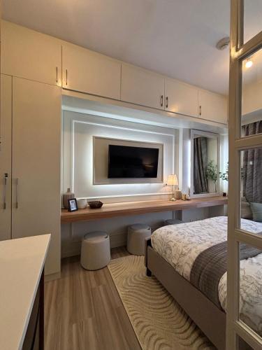 Ένα ή περισσότερα κρεβάτια σε δωμάτιο στο Luxury Haven in Cebu IT Park at Avida Towers Riala