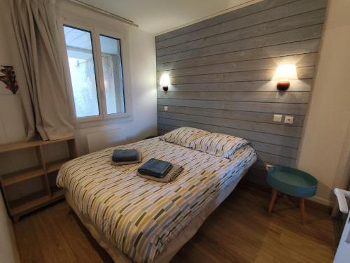 Postel nebo postele na pokoji v ubytování Appartement Le Refuge du Vautour