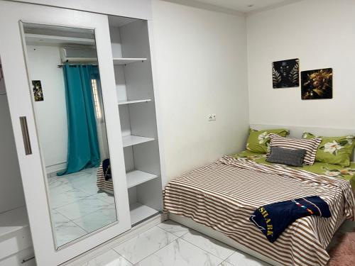 Ένα ή περισσότερα κρεβάτια σε δωμάτιο στο LUXES Appartement