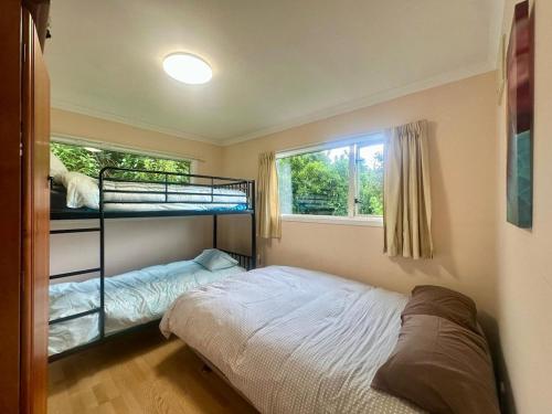 Ένα ή περισσότερα κρεβάτια σε δωμάτιο στο From Bush to Sea