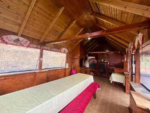 Postel nebo postele na pokoji v ubytování Panoramic Apuseni Doda Pilii