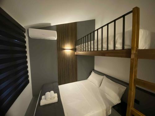 En eller flere senge i et værelse på Casa Olymbra